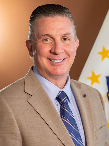 Official portrait of Jon Brien, archived from ri-ga-member-directory.
