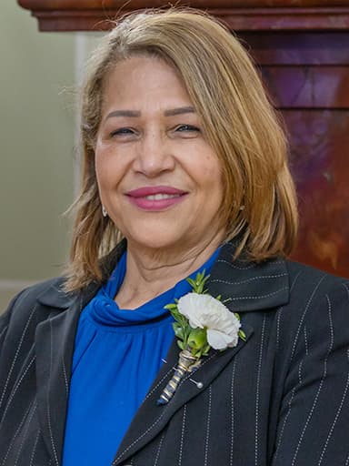 Official portrait of Ana Quezada, archived from ri-ga-member-directory.