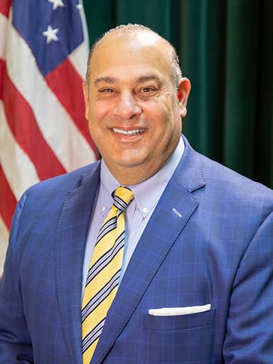 Official portrait of David Tikoian, archived from ri-ga-member-directory.