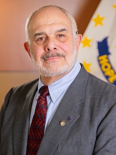 Official portrait of Richard Fascia, archived from ri-ga-member-directory.