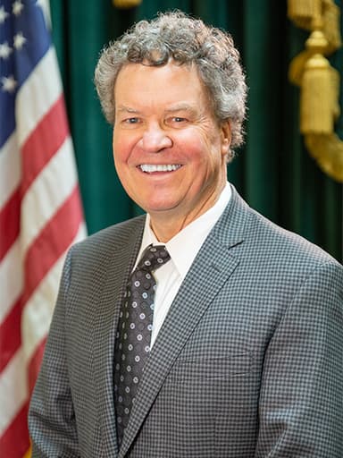 Official portrait of Walter Felag, archived from ri-ga-member-directory.