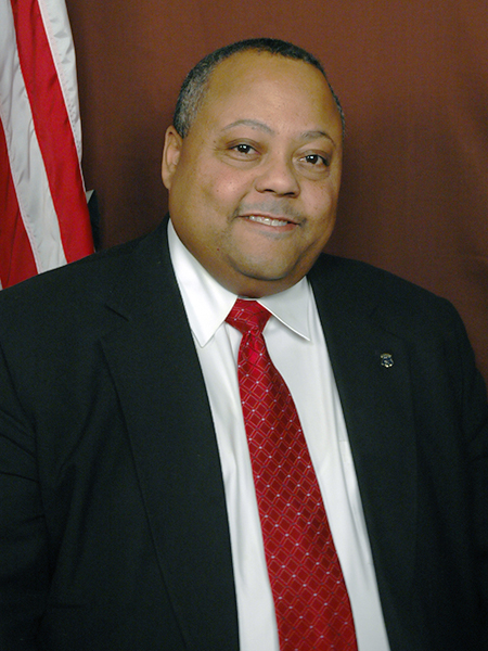 Official portrait of Raymond Hull.