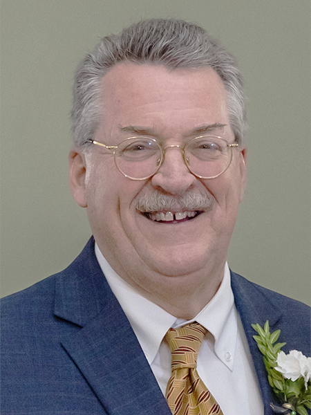 Official portrait of Mark McKenney.